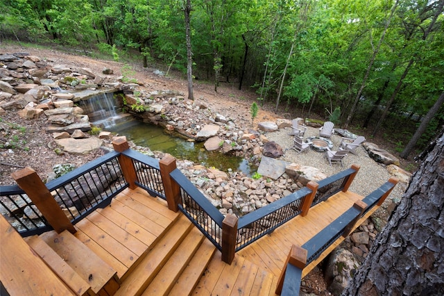 wooden terrace with a forest view