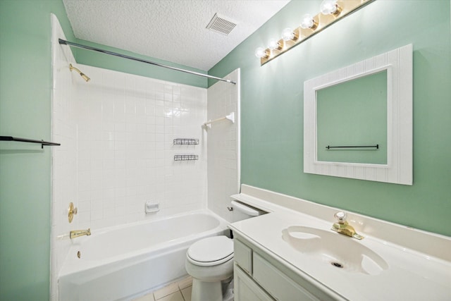 full bathroom featuring tile patterned floors, bathtub / shower combination, vanity, a textured ceiling, and toilet