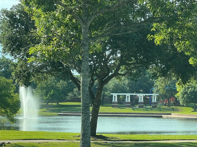 surrounding community featuring a yard