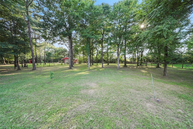 view of yard with fence