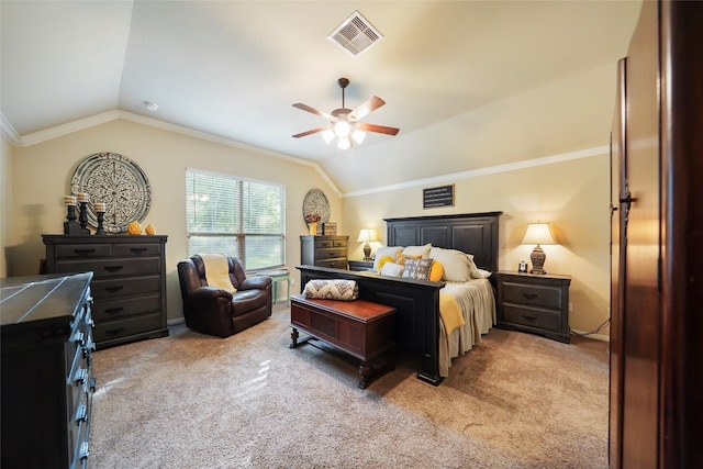 bedroom with lofted ceiling, ceiling fan, light colored carpet, visible vents, and crown molding