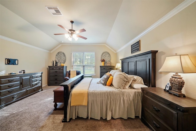 carpeted bedroom with visible vents, vaulted ceiling, and crown molding