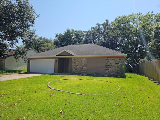 ranch-style house featuring a garage and a front lawn