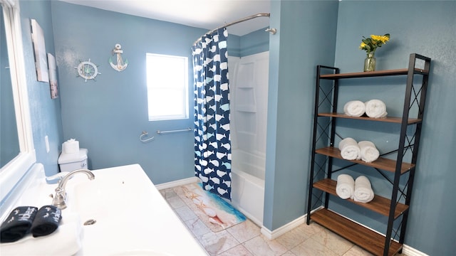 bathroom featuring tile flooring and shower / tub combo with curtain