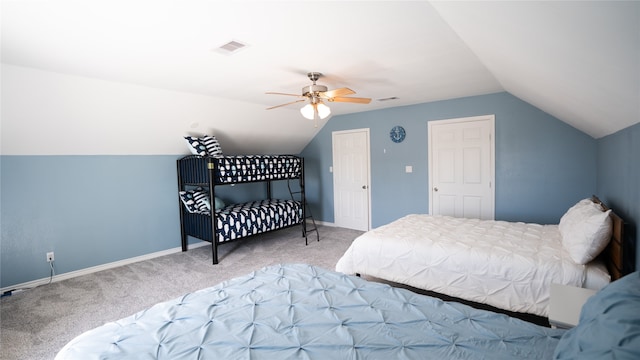 bedroom featuring carpet, ceiling fan, and vaulted ceiling