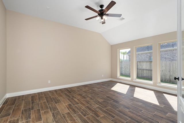 spare room with french doors, ceiling fan, dark hardwood / wood-style flooring, and lofted ceiling