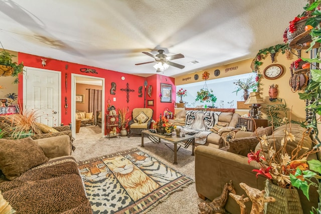 living room with carpet, a textured ceiling, and ceiling fan