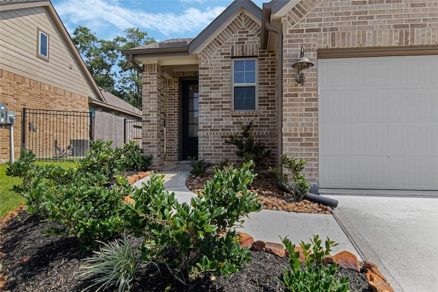 entrance to property featuring a garage