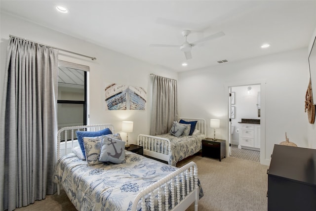 carpeted bedroom featuring ceiling fan