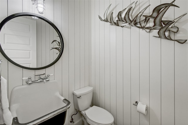 bathroom featuring sink and toilet