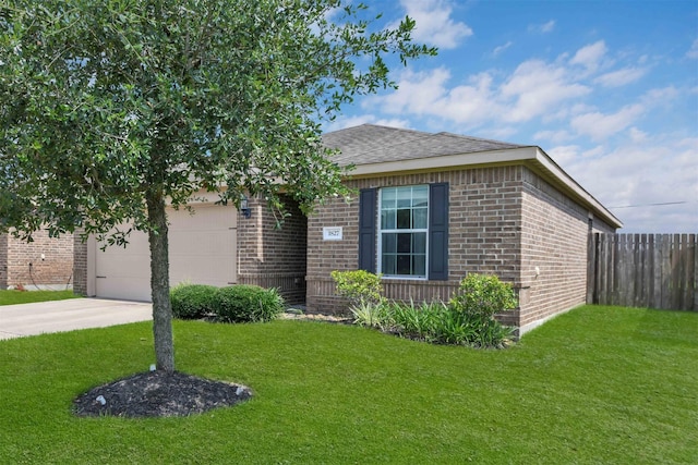 view of front facade featuring a front yard and a garage