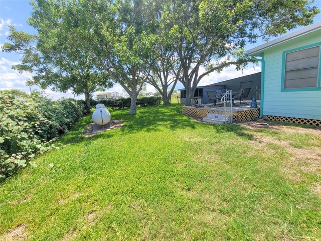 view of yard featuring a deck