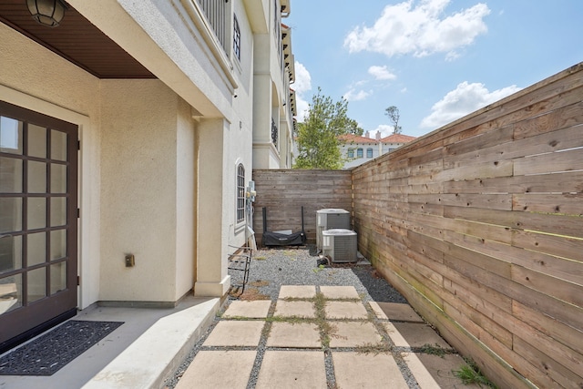 view of patio with central air condition unit