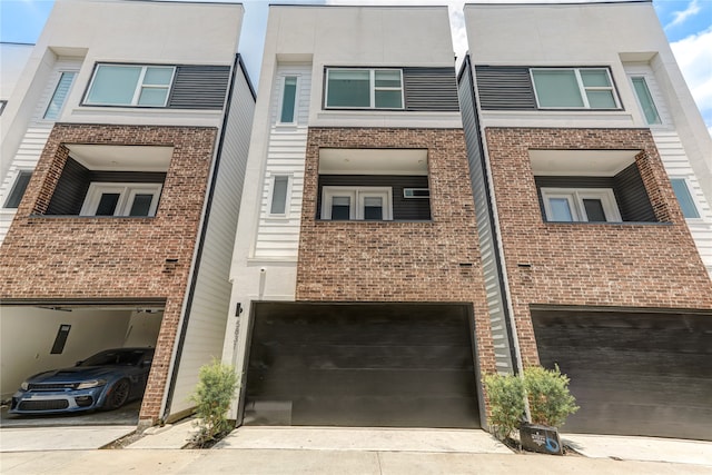 view of building exterior featuring a garage