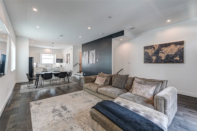 living room with hardwood / wood-style floors