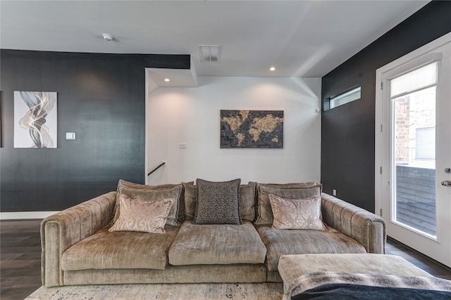 living room with dark hardwood / wood-style flooring