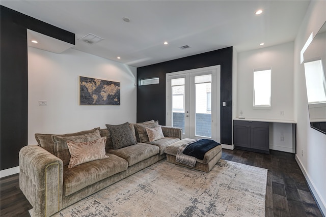 living room with french doors and dark wood-type flooring