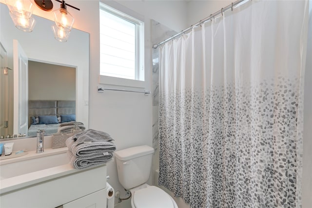 bathroom with oversized vanity and toilet