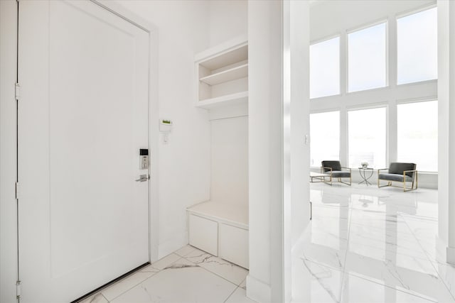 mudroom with light tile flooring