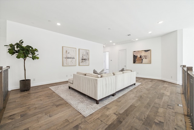 living room with hardwood / wood-style flooring