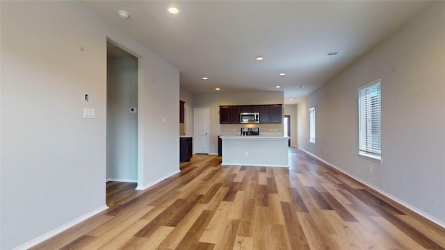 unfurnished living room featuring light hardwood / wood-style flooring