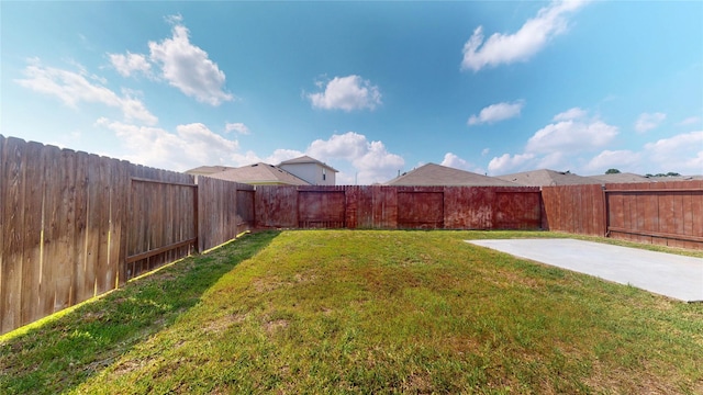 view of yard with a patio area