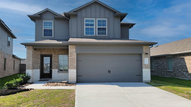 craftsman house with a garage and a front lawn