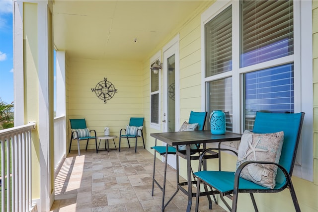 balcony featuring a porch