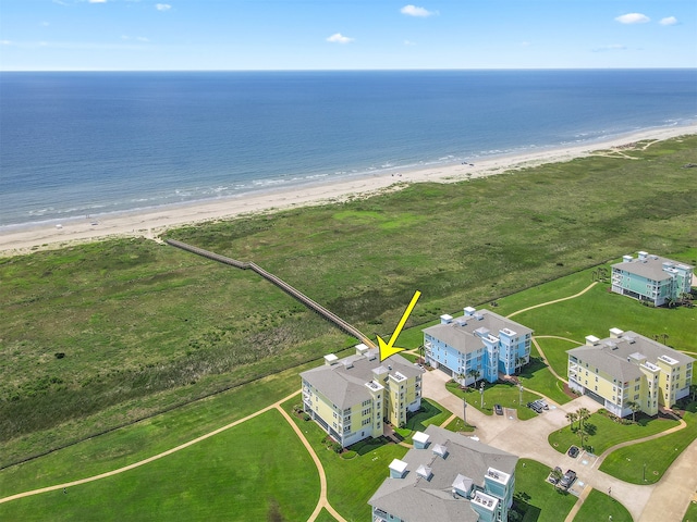 aerial view featuring a beach view and a water view