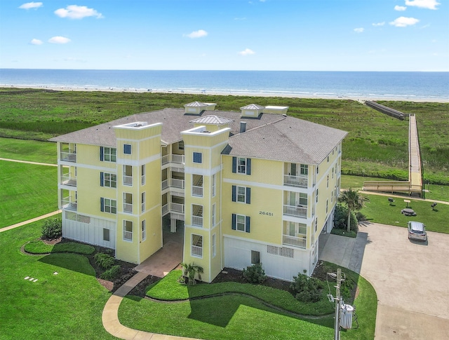 drone / aerial view with a water view