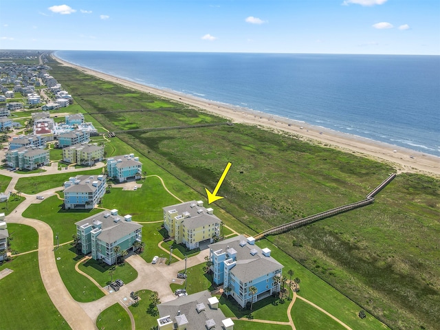 bird's eye view featuring a beach view and a water view