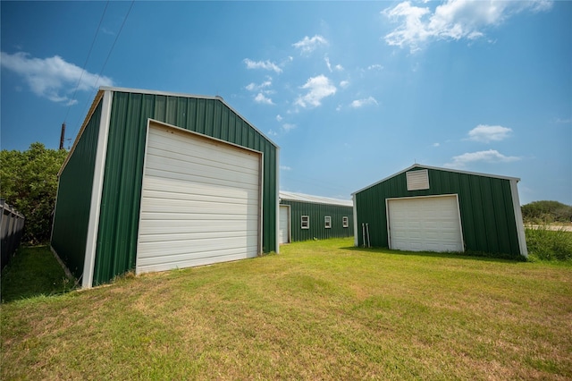 garage featuring a yard