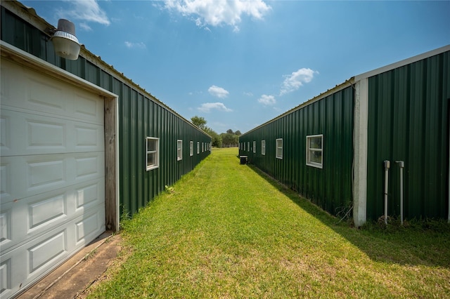 view of yard with a garage