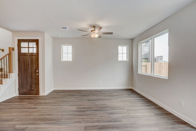 foyer entrance featuring ceiling fan and light hardwood / wood-style floors