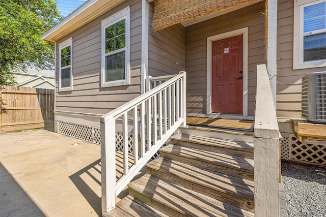 doorway to property with central AC