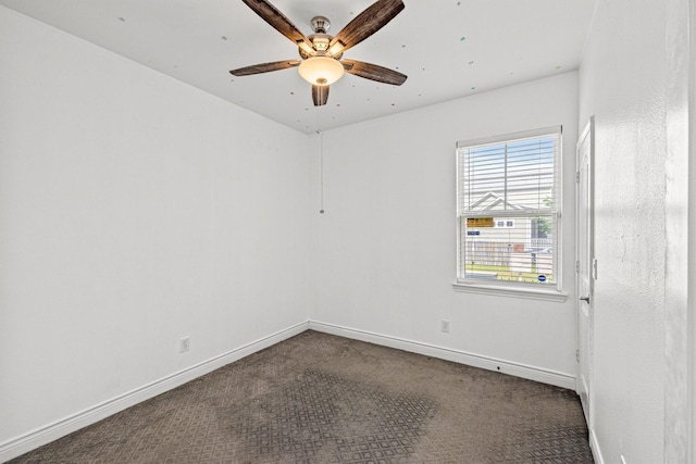 unfurnished room with ceiling fan