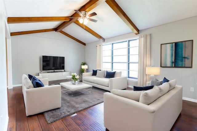 living area with lofted ceiling with beams, baseboards, dark wood finished floors, and a ceiling fan