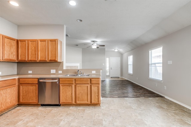 kitchen featuring light hardwood / wood-style flooring, stainless steel dishwasher, ceiling fan, and sink