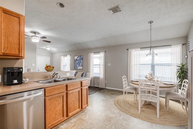 kitchen with dishwasher, a healthy amount of sunlight, and sink