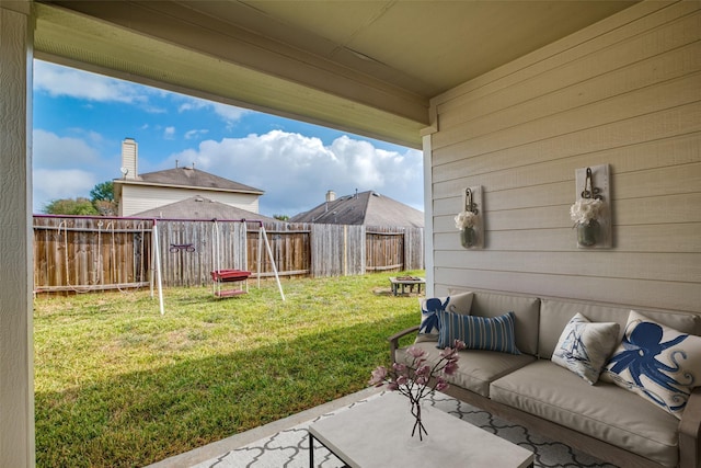 view of yard featuring an outdoor living space and a patio area