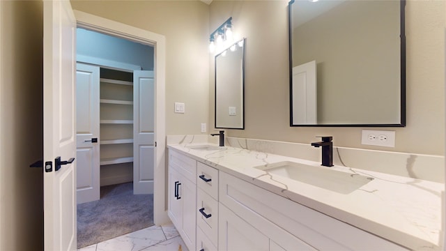 bathroom featuring tile flooring and double vanity