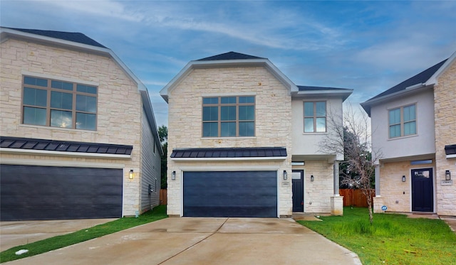 view of front of property with a garage