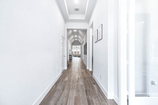 hallway with wood-type flooring