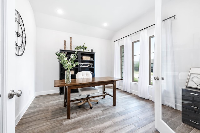 office space with vaulted ceiling