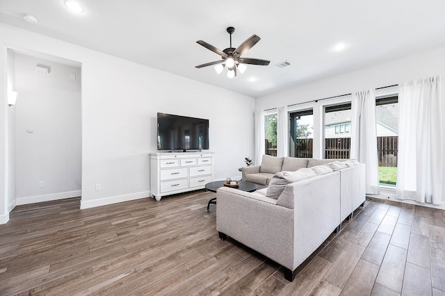 living room featuring ceiling fan