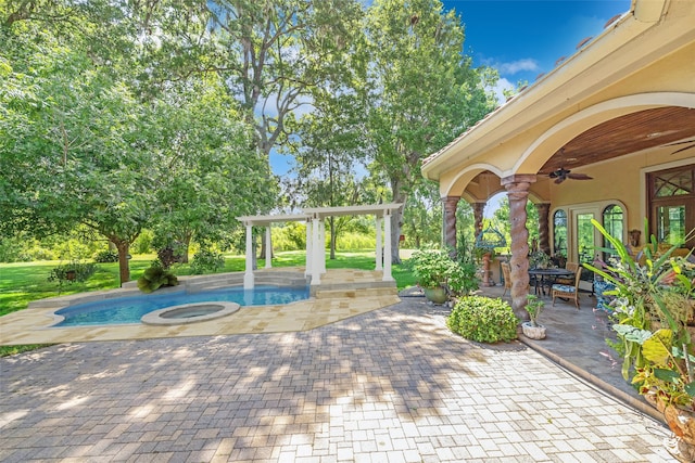 view of patio with a pergola, a swimming pool with hot tub, and ceiling fan