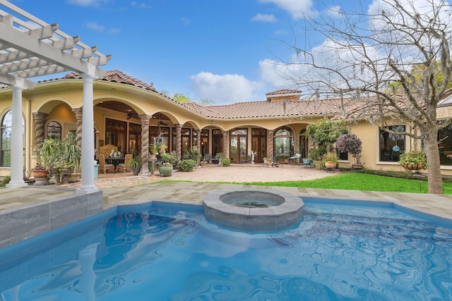 view of pool featuring an in ground hot tub, a patio, ceiling fan, and a pergola