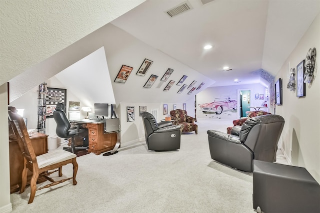 carpeted living room with vaulted ceiling