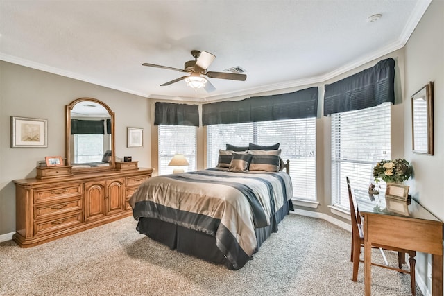 carpeted bedroom with ceiling fan, ornamental molding, and multiple windows