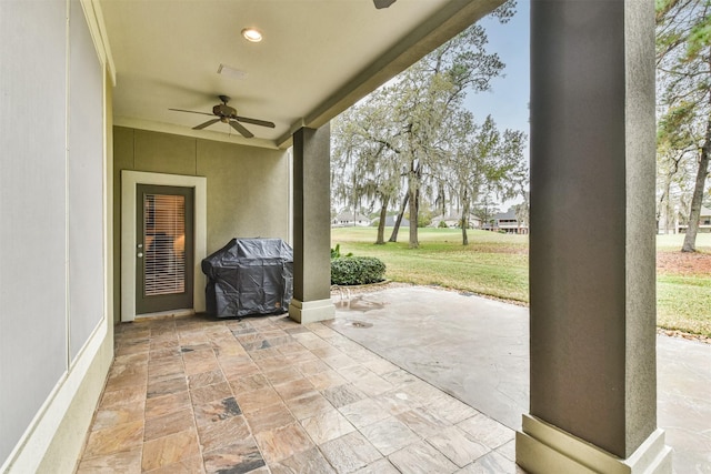 view of patio / terrace with ceiling fan and grilling area